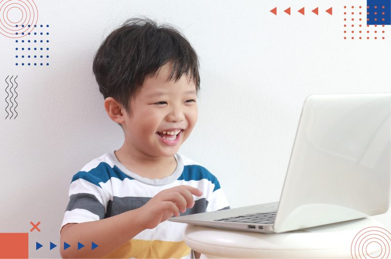 Happy kid participating in an online learning class using StudySmart.