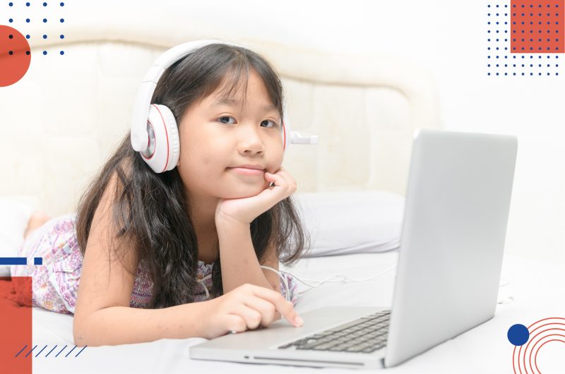 A child using AI powered learning app for PSLE exams|A child prepares for the PSLE exam with the online PSLE learning app.|A young child attending online school in Singapore