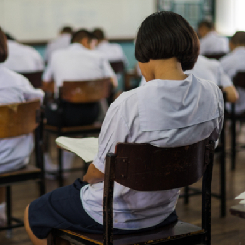 A school student for the PSLE exam in the classroom.